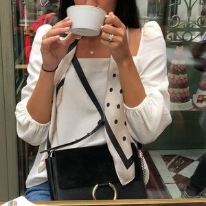 Express white top with square neck and puff shoulder detail